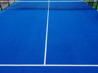 Blue artificial grass paddle tennis court