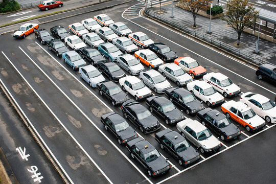 Many Taxis Parked Orderly in Japan