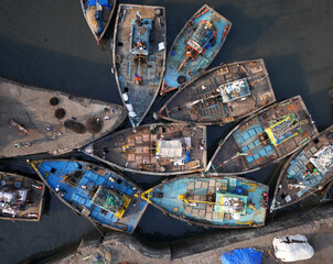 A cluster of fishing vessels in Mumbai. 
