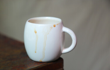 dirty coffee on side of hot cup glass from drinking for cleaning concept