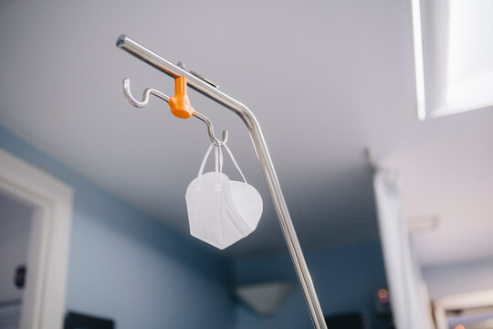 Medical mask on hook in hospital
