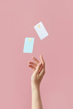 Woman reaching credit cards