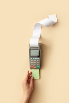 Woman inserting card in POS terminal