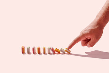 Man pushing row of chewing gums