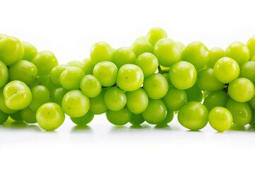 Wall of fresh harvested, plump green grape or muscat grapes. Isolated on pure white background.