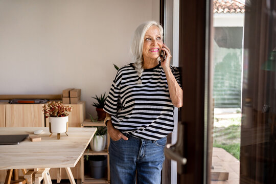 Middle age woman calling by phone 