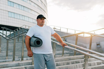 Fat man walking down the stairs