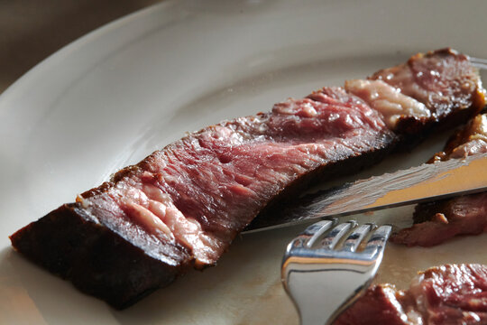 Sliced Tomahawk Steak.