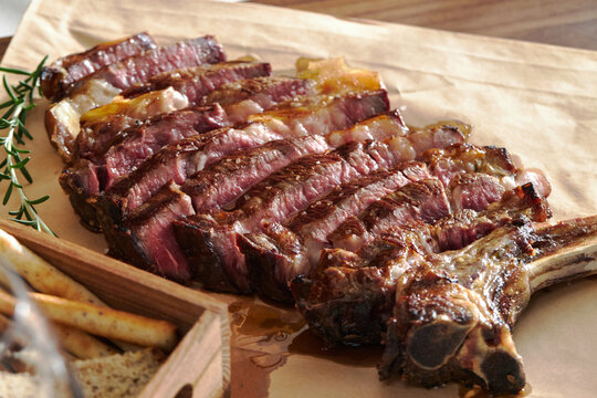 Sliced Tomahawk Steak.