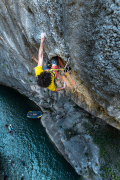Sportsman rock climbing