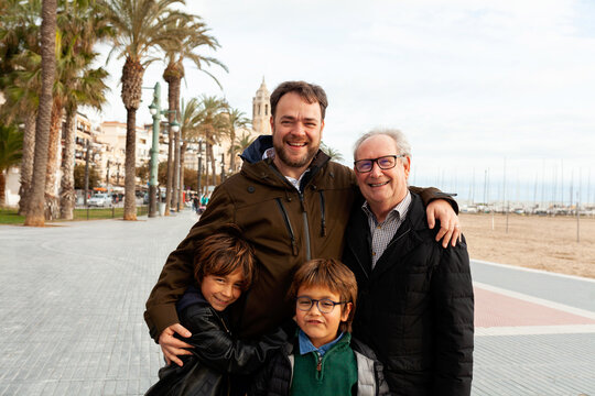 Portrait of male three generations on the beach