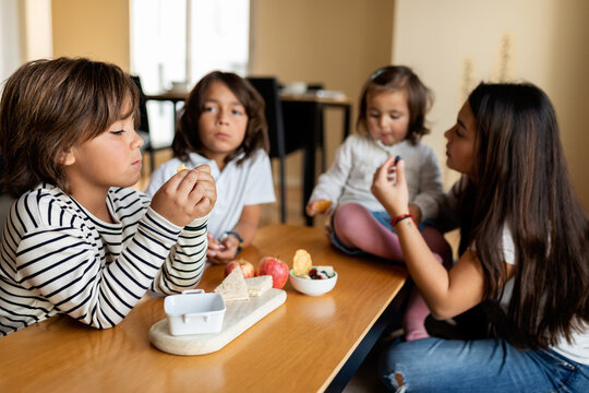kids eating snack at home