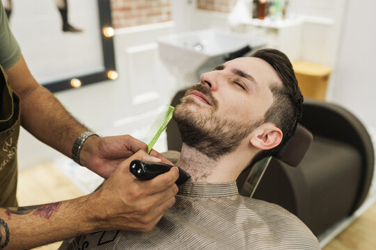 Beard trimming in the barbershop