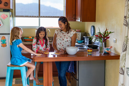 Family Tortilla Making on barstools 