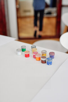Palette of color paint on table