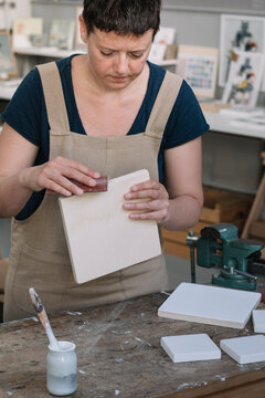 Young Artist Preparing Canvas For Painting