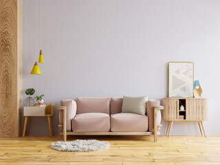 Interior living room wall mockup with pink sofa and decor.