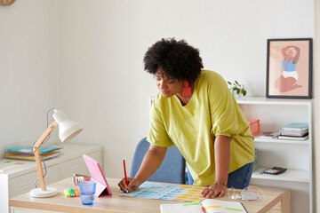 Woman working on design project