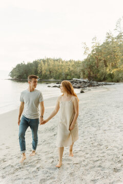Young couple walking on a beach