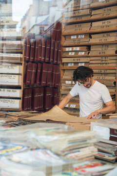 Man In Archive Of Press