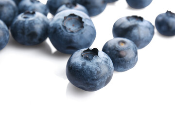 Tasty ripe bilberries on white background