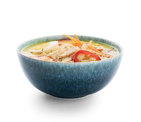 Bowl of tasty Thai soup on white background