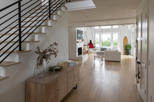 Child on Swing indoors at home