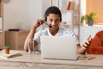 African-American technical support working at home