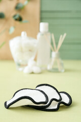 Reusable cotton pads on color table