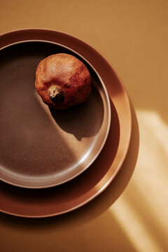 Plates and pomegranate