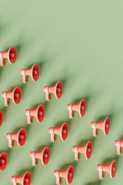 cordless loudspeakers on a pastel green background