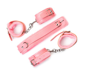 Collar and handcuffs from sex shop isolated on white