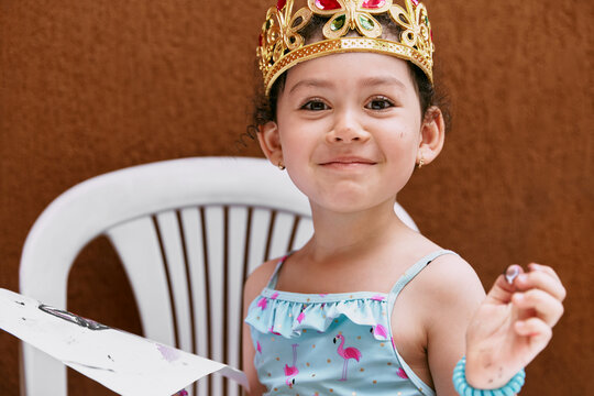 Smiling girl looks at the camera