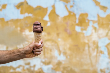 Man with chocolate ice cream cone