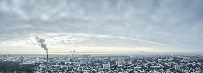 aerial panoramic view of Minsk city, covered by snow in cold winter day. winter cityscape under overcast sky.