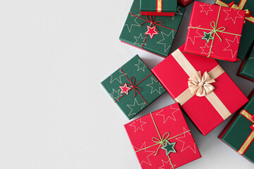 Different Christmas gift boxes on white background