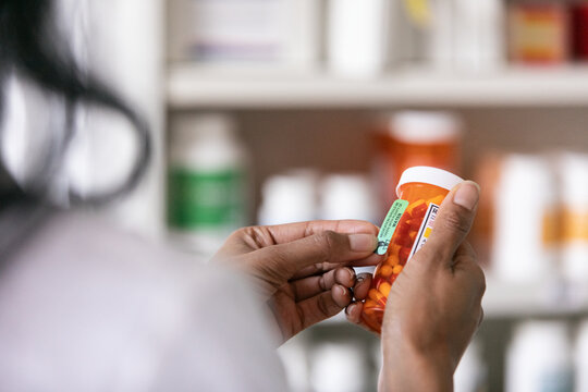 RX: Pharmacist Applies Warning Label