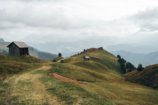 Alpine Huts on Hills in the Alps