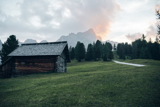Alpine hut at sunset