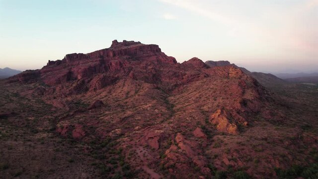 Epic Red Mountain Aerial Orbit at Sunset in Arizona Desert by Phoenix