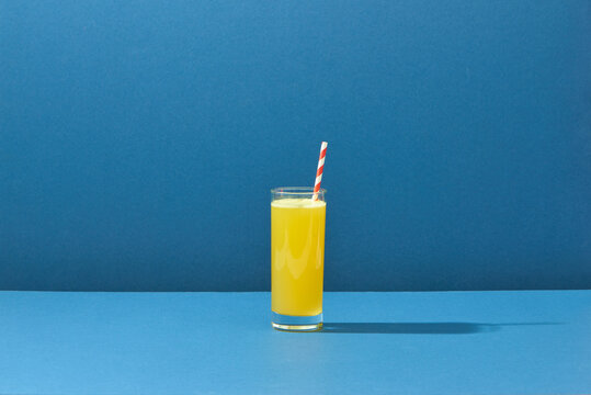 pineapple juice isolated on blue