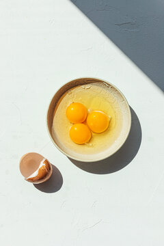 Cracked eggs in a dish