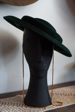 Wedding style velvet hat on a mannequin in the showroom