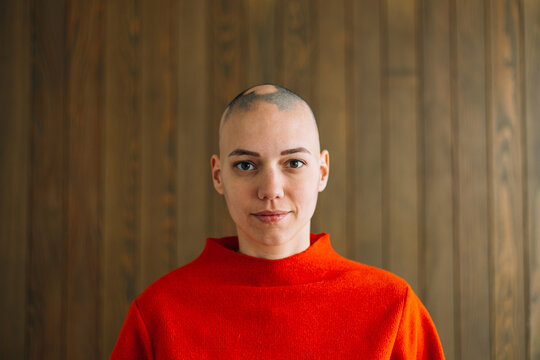 Woman in an orange sweater