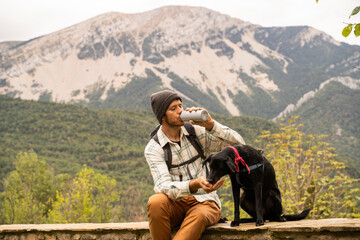 Break hiking man with pet