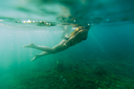 Underwater image of a woman swimming 