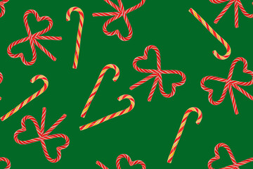 seamless pattern of Christmas candies on a green background