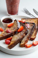 French toasts with coffee on white table top