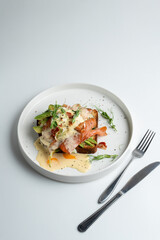 California healthy breakfast in a trendy coffee house, salmon and poached egg song with, white minimalistic photo