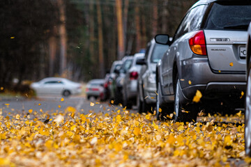Moscow, Russia - October, 23, 2021: cars on a street parking in Moscow at autumn, Russia